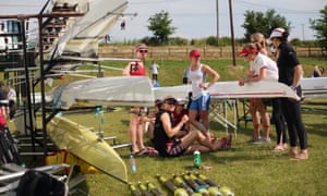 Competitors relax by their boat after racing on the first day of the Henley Women's Regatta, England. The annual 3-day event, which has taken place since 1988, sees female crews from the UK and abroad compete.