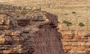 Gulp. Nik Wallenda walks without any harnesses or any safety precautions on a tightrope stretched across the Little Colorado River Gorge near the Grand Canyon, US.