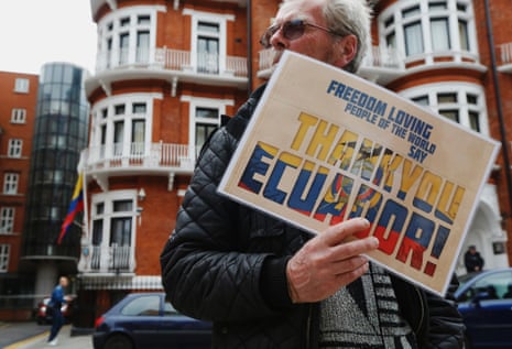 A supporter of Edward Snowden holds a sign that reads "Thank You Ecuador", outside the Embassy of Ecuador in London June 24, 2013.