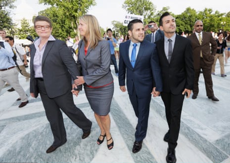 Plaintiff couples Sandy Stier (L) and Kris Perry (2nd L), and Paul Katami (R), and Jeff Zarillo (2nd R) arrive at the U.S. Supreme Court building on June 26, 2013 in Washington, DC.