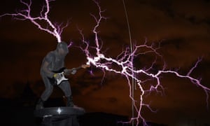 The guitarist of the band "Lightningfan" Wang Hongbin creates lightning with a Tesla Coil in Fuzhou, China