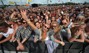 At the front of the Pyramid stage, spectators await the next band.