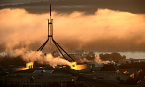 Parliament emerges from the dawn fog. The Global Mail. Mike Bowers