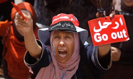 An Egyptian woman shouts slogans during a protest against President Mohammed Morsi in Cairo