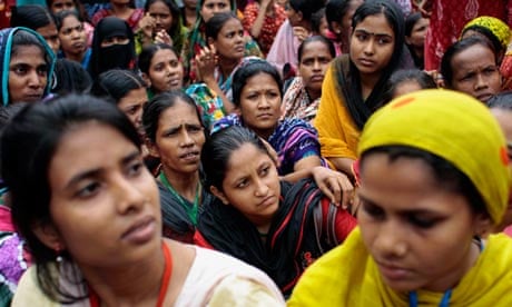 Bangladeshi women protest over pay and working conditions outside a garment factory in Dhaka.
