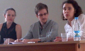 Edward Snowden along with Sarah Harrison of WikiLeaks (left) at a press conference in Sheremetyevo