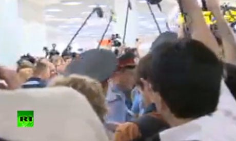 A media scrum after Edward Snowden's meeting at Moscow's Sheremetyevo airport on 12 July 2013.