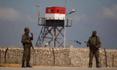 Hamas security guards on Gaza's border with Egypt