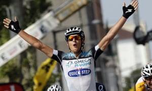 Italy's Matteo Trentin celebrates as he crosses the finish line at the end of the 191km stage.