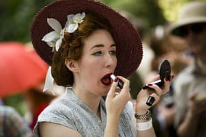 Chap Olympiad: A woman attends to her make-up as revellers gather at the Chap Olympiad.