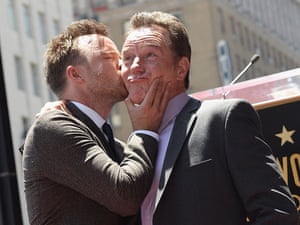 Breaking bad - in public: Actor Aaron Paul (L) kisses actor Bryan Cranston on the Hollywood Walk of Fame in Hollywood, California.