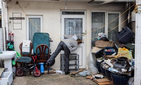 A Newham Council planner inspects an apartment built in the back garden of a house