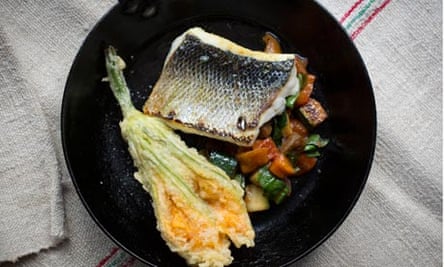Sea bass with slow-roasted summer vegetables and fried courgette flower