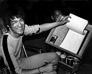 Bruce Lee: Bruce Lee sketching on the set for Game of Death