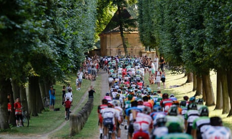 The riders head out of Versailles.