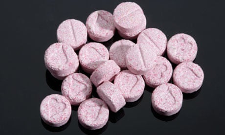 Pink coloured Ecstasy tablet illegal drugs Pills