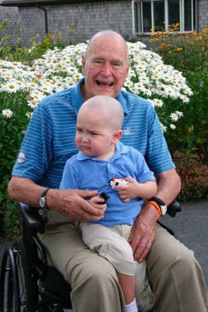 Former US President George Bush at Walker's Point, Maine after joining members of his Secret Service detail in shaving his head to show support for Patrick, the two year-old son of a detail member who is being treated for leukemia.