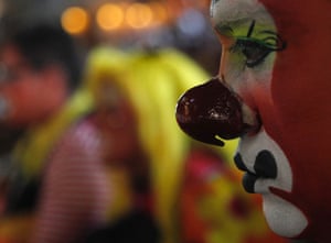 It's no laughing matter but a moment of contemplation for a clown attending mass at the Basilica of Guadalupe in Mexico City. Hundreds of colourful clowns took part in the annual event to give thanks to the Virgin of Guadalupe for helping them find work through the year.