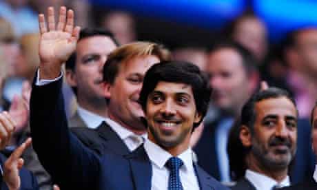 Sheikh Mansour waves to Manchester City fans