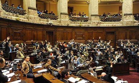 Uruguayan MPs vote through the bill legalising a marijuana market.