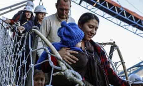Hannah Gastonguay disembarks in Chile with her baby Rabah, daughter Ardith and husband Sean.