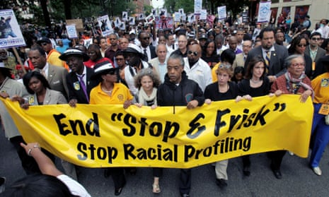 The Reverend Al Sharpton walks with demonstrators during a silent march to end New York's "stop-and-frisk" program. A US District Court judge has ruled that the New York Police Department deliberately violated the civil rights of tens of thousands of New Yorkers.