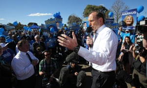 Opposition leader Tony Abbott addresses supporters at the launch of the Liberal party campaign bus during the 2013 federal election campaign.