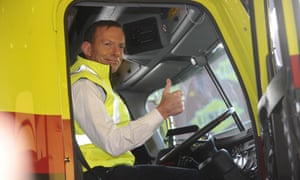 Opposition Leader Tony Abbott tries out the drivers seat of Linfox Freightliner during a visit to Linfox in Melbourne, Friday, Aug. 16, 2013.