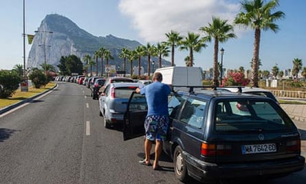 Motorists queue to cross the border between Spain and Gibraltar, 15 August.