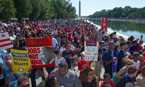 Marchers line the reflecting pool in Washington DC