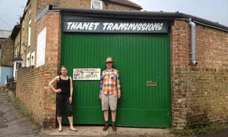 Jessica Voorsanger with Bob and Roberta Smith outside his studio in a converted garage in Ramsgate