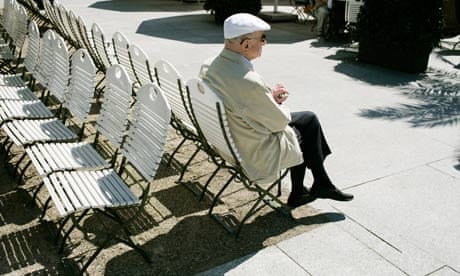 Older man alone on seats