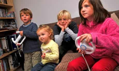Children playing on Wii computer game
