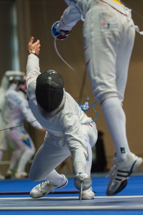 Benjamin Steffen of Switzerland, left, and Yulen Pereira of Spain fight in the men's individual epee competition of the fencing World Championships in Budapest, Hungary.