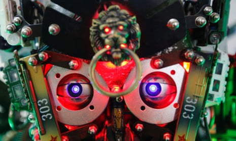 The eyes of Chinese inventor Tao Xiangli's self-made humanoid robot at his house in Beijing. The self-taught inventor built the home-made robot, named The King of Innovation, out of scrap metal and electronic parts that he bought from a second-hand market. The robot, which measures 2.1m high and 480 kg in weight, turned out to be too tall and heavy to walk out of the front door of his house. But it can perform simple movements with its hands and legs and also mimic human voices.
