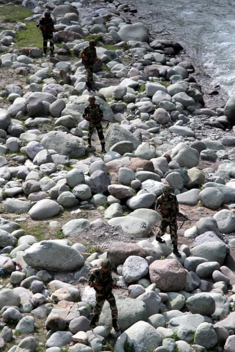 Indian Border Security Force (BSF) soldiers patrol near the Line of Control (LoC) in the Sabjiyan sector of Poonch about 200 miles from Jammu, the winter capital of Kashmir, India. Five Indian soldiers were killed in India-administered Kashmir on 6 August, allegedly by gunmen from Pakistan.