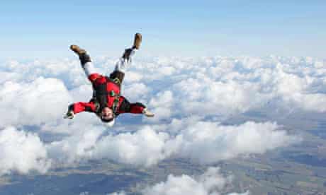 Skydiver falls head down