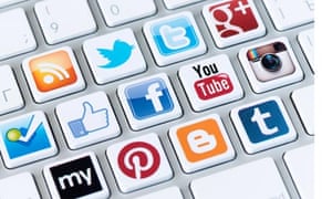 A keyboard showing well-known social media brands