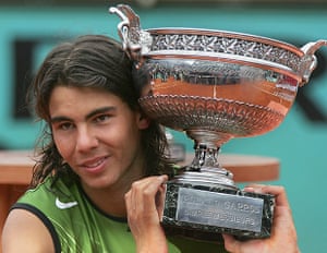Nadal's trophies: 2 Spanish Rafael Nadal holds his trophy af