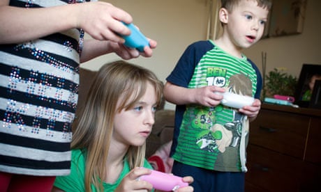 Children playing on video games