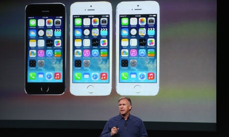 Phil Schiller with the new iPhone 5S