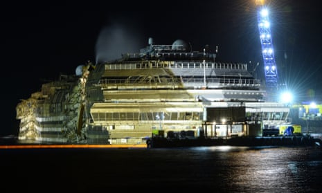 The wreck of Italy's Costa Concordia standing upright in the water.
