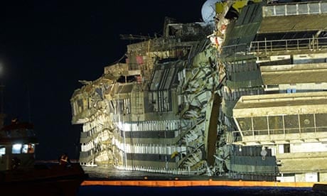 The side of the Costa Concordia that has been under water for nearly two years is revealed.