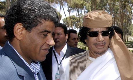 Abdullah al-Senussi with Muammar Gaddafi