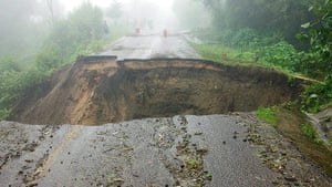 mexico floods: A damaged road 