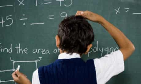 Boy doing math formulas