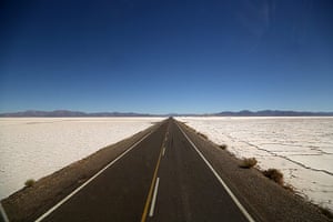 Andes crossing: Road across the salt flats in the high andes