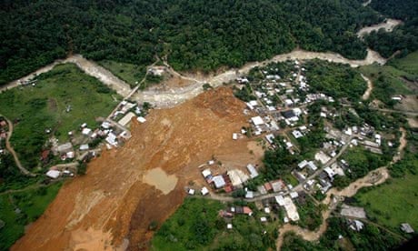 An aerial photograph shows the destruction caused by a landslide that swept through La Pintada