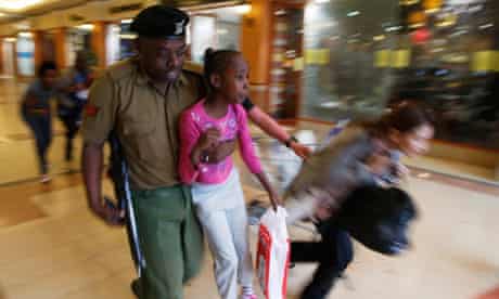 A soldier carries a child to safety in Nairobi