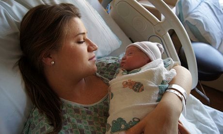 newborn baby girl in hospital with mom